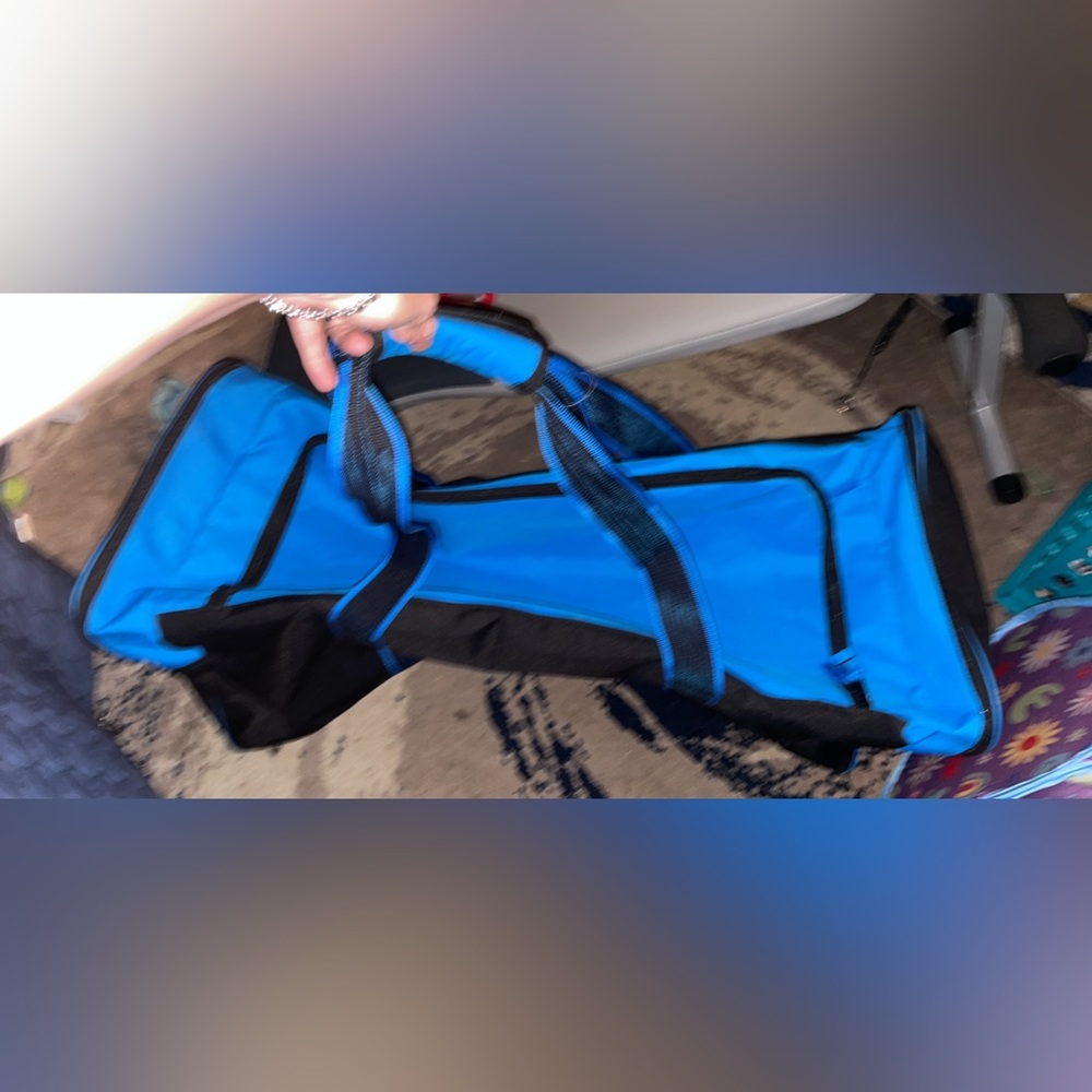 Black and blue hockey bag. Was only used to store gym equipment on home